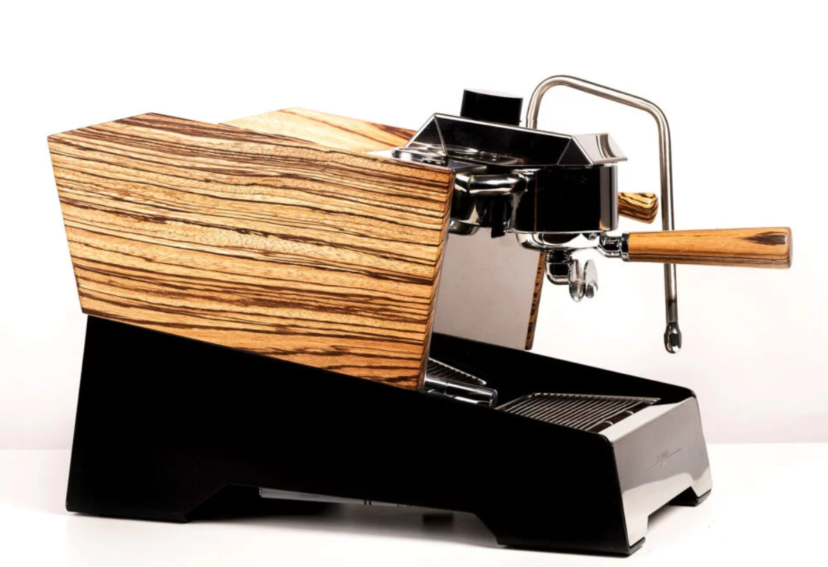 Nurri Type R 1 Group Espresso Machine with a white background. The machine has a Black & Zebrano (wooden) finish.
