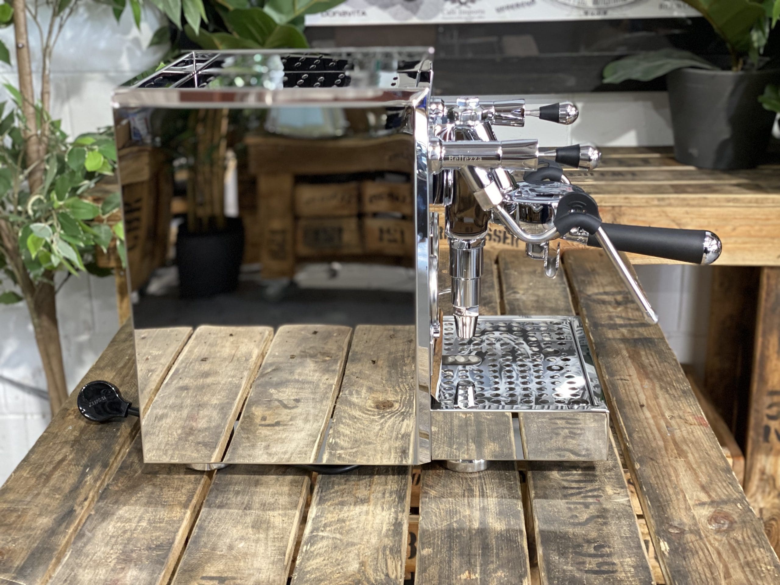 Bellezza Gulia Lever 1 Group Stainless Espresso Machine - New on a wooden table, showcasing its sleek design and chrome finish.