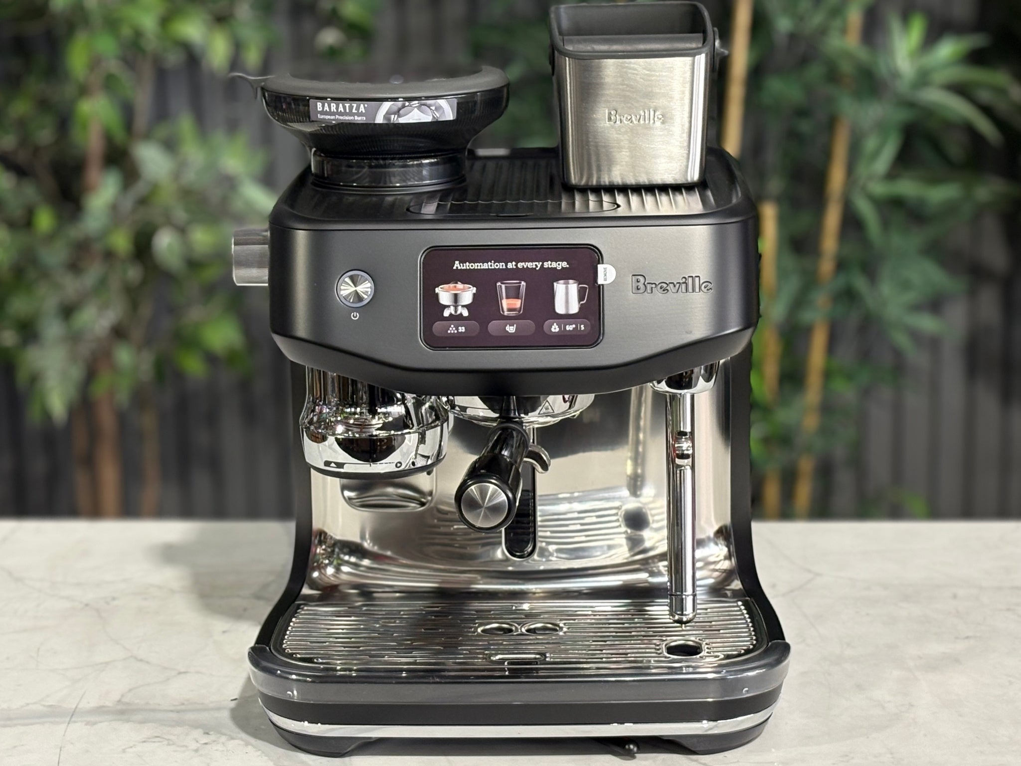 Breville Oracle Jet 1 Group Coffee Machine Black - New, close-up front view on a marble bench, detailing the touch screen controls, milk steamer wand, and 1 group head.