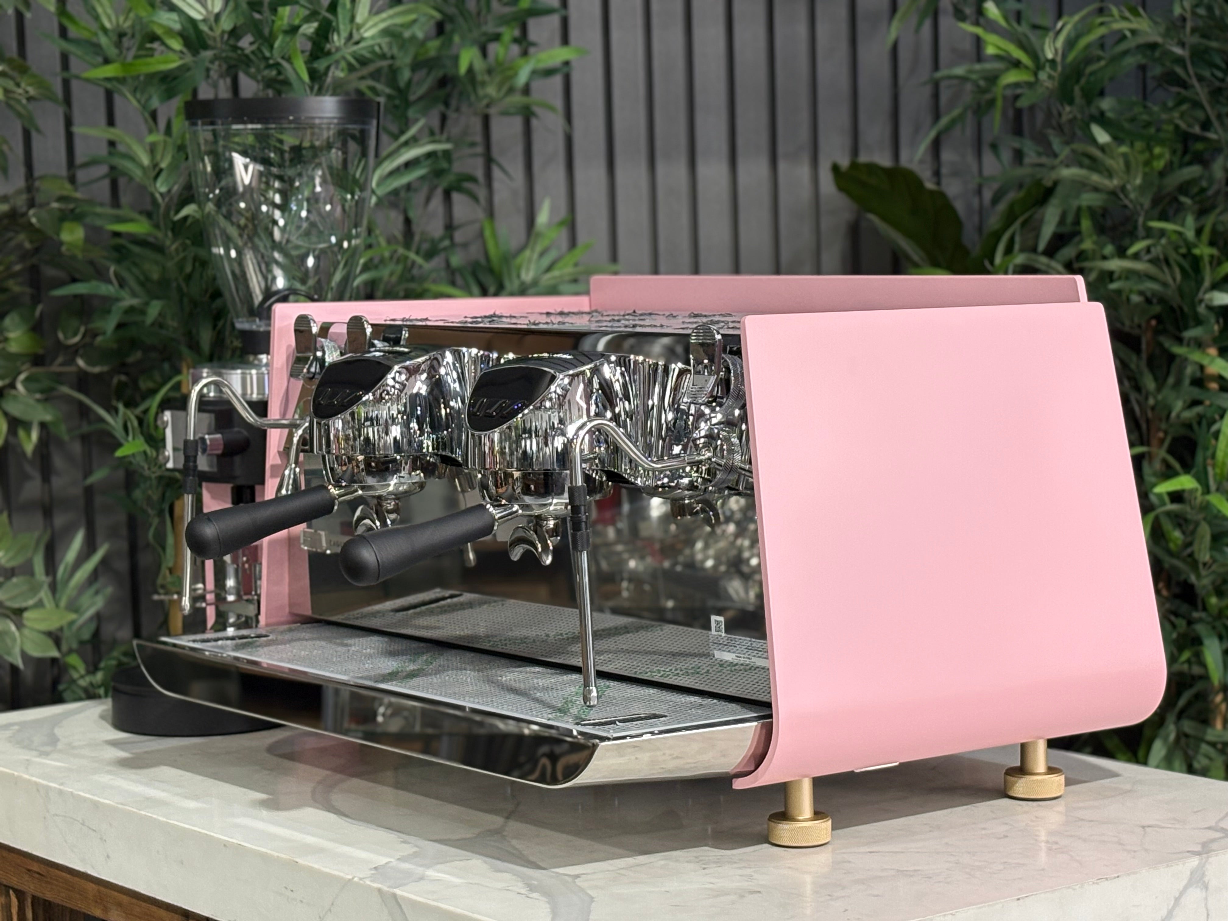 Victoria Arduino Eagle One 2 Group Coffee Machine Custom Pink & Gold showcased in modern café setting.