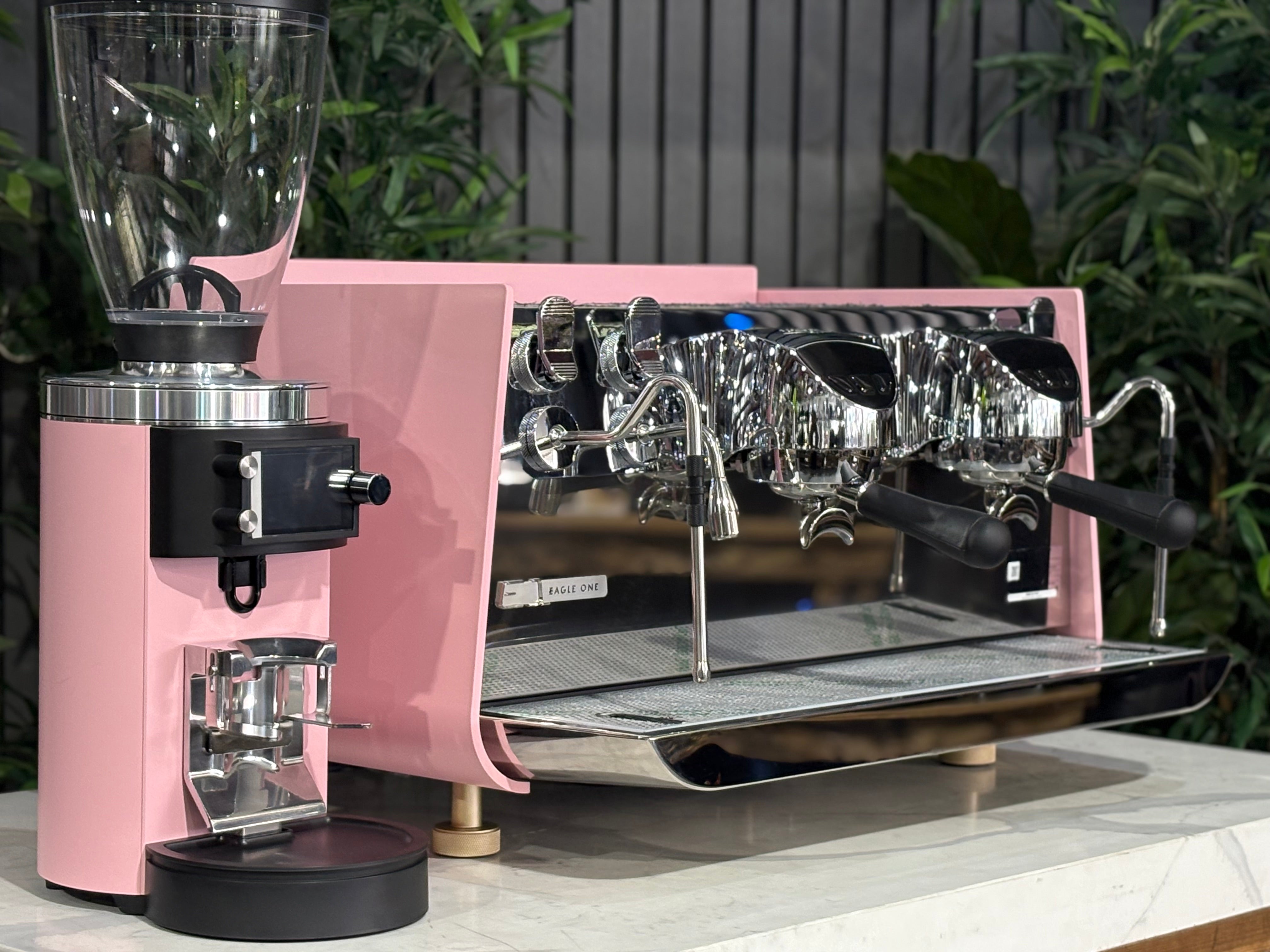 Victoria Arduino Eagle One 2 Group Coffee Machine Custom Pink & Gold displayed alongside Mahlkönig E65 GBS Grinder
