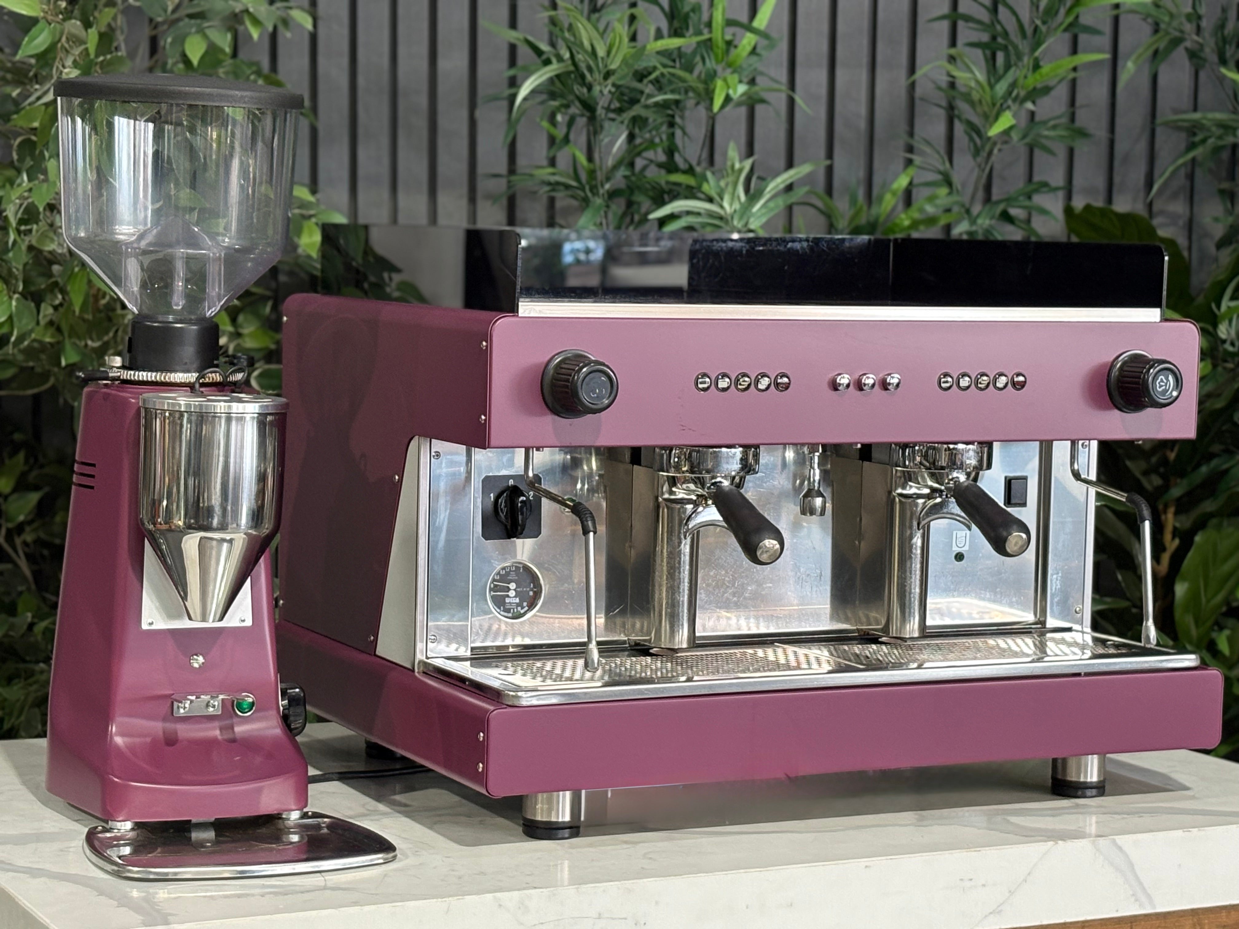 Wega Pegaso EVD 2 Group Coffee Machine & Mazzer Major Electronic Grinder in deep pink finish.