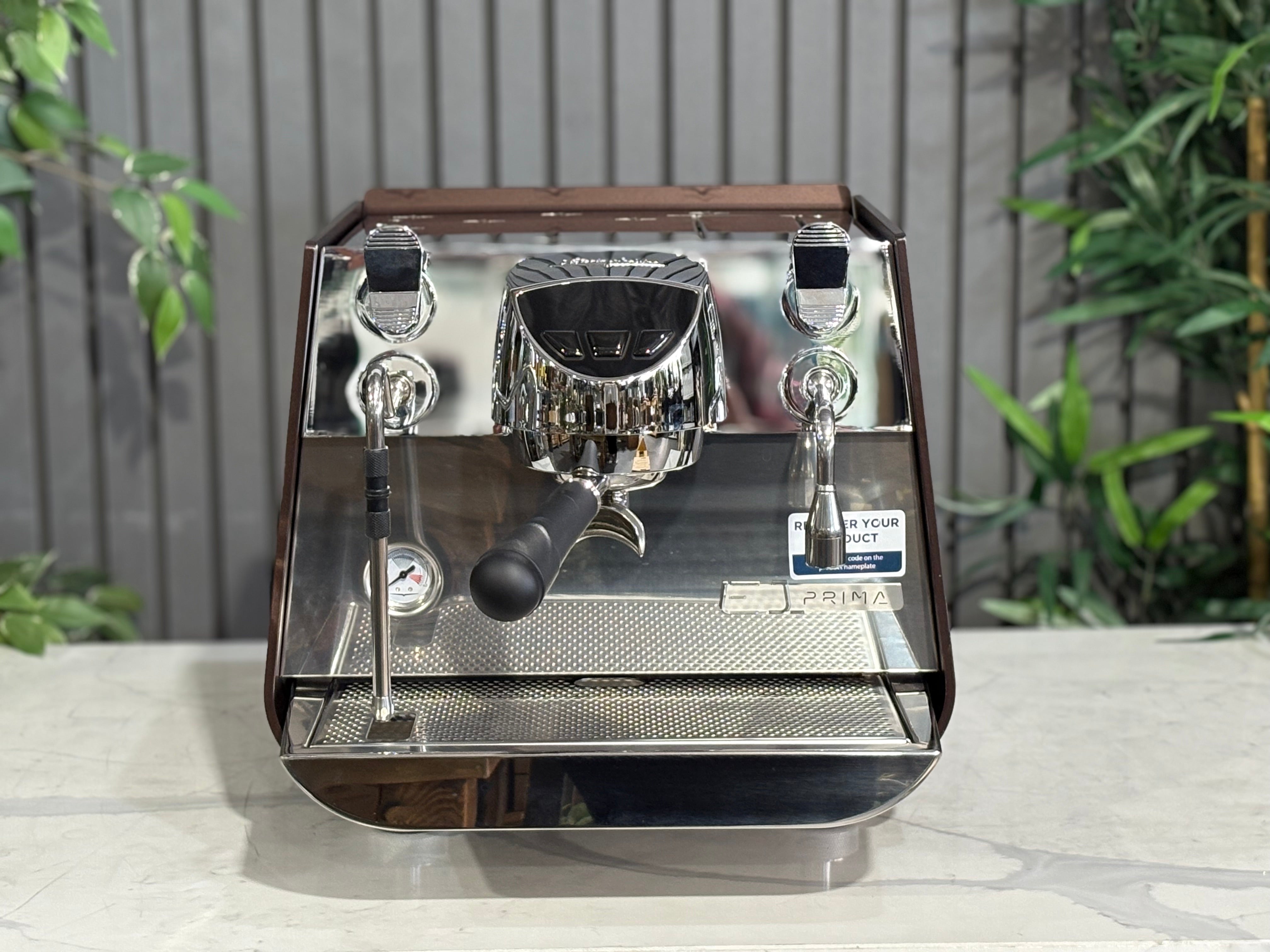 Victoria Arduino Eagle One Prima 1 Group Espresso Machine in burnished copper finish on a modern countertop.