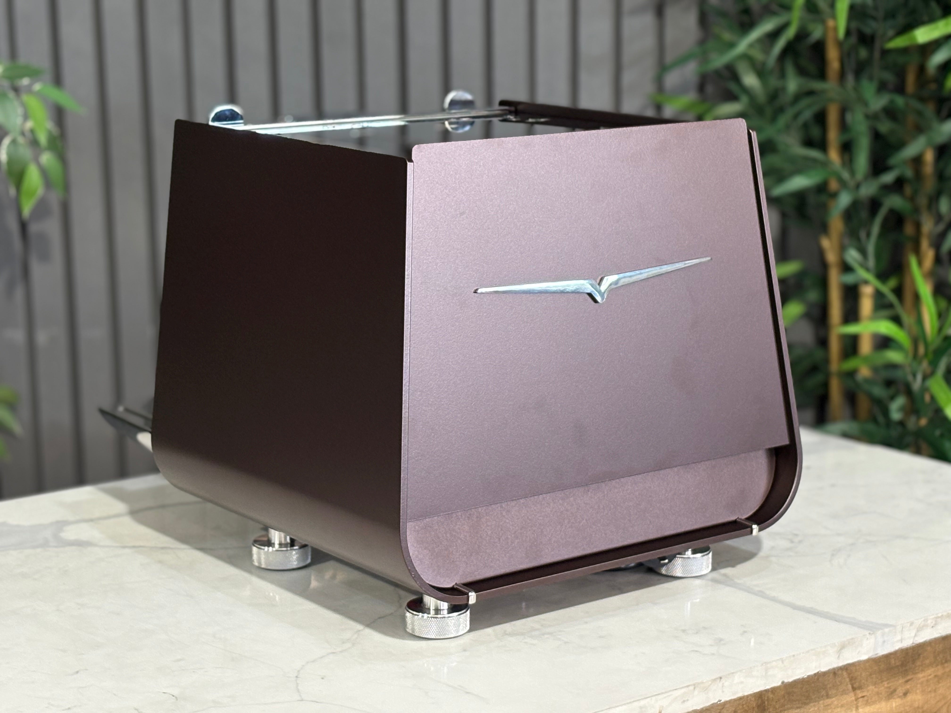 Victoria Arduino Eagle One Prima 1 Group Espresso Machine burnished copper finish on a wooden surface