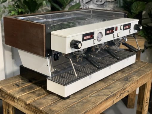 La Marzocco Linea 3 Group White & Timber W Chronos - Used displayed on wooden table, showcasing its elegant design.