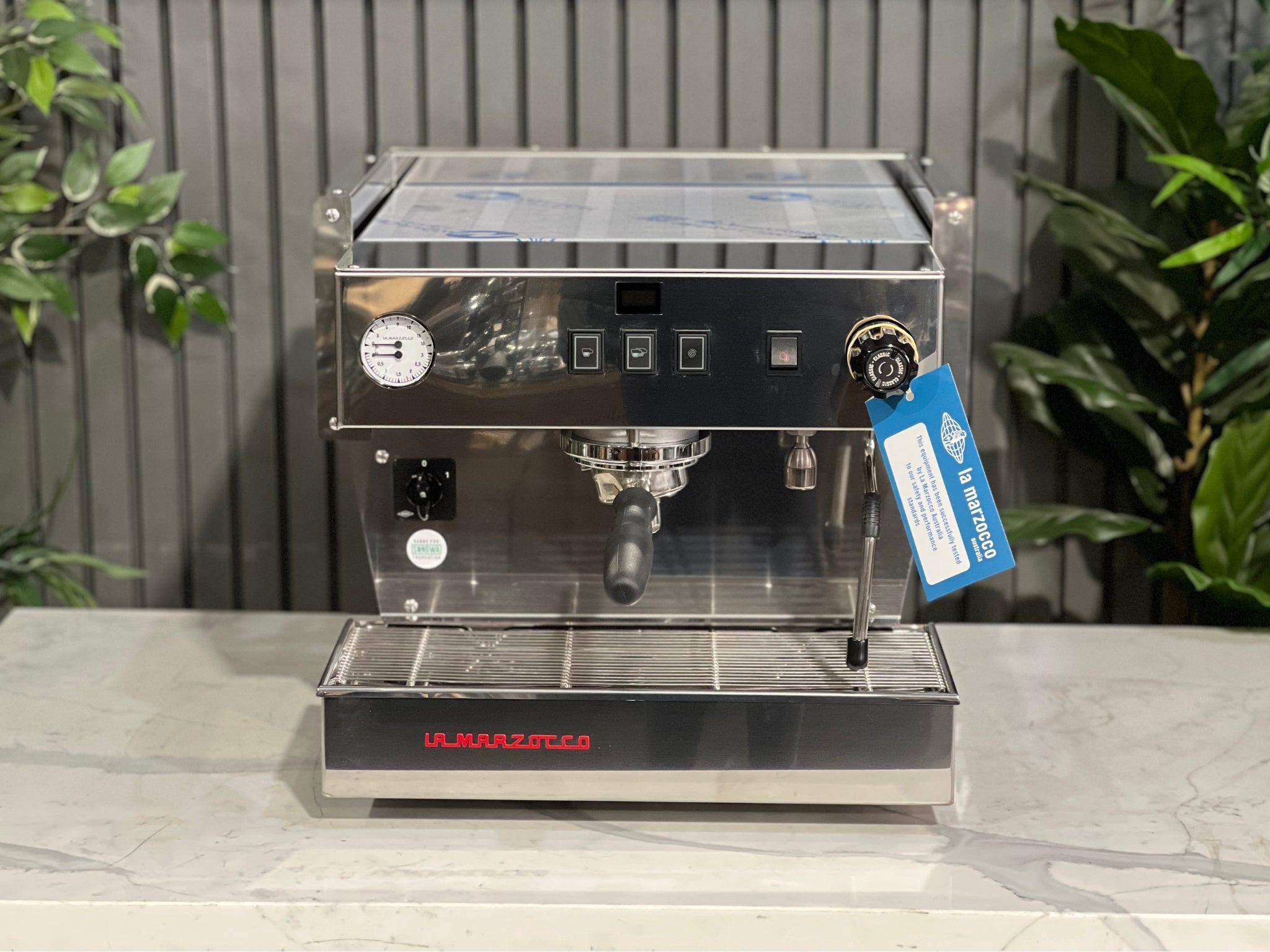 La Marzocco Linea Classic S AV 1 Group Coffee Machine Stainless – New espresso coffee machine photographed from a higher front angle, revealing the stainless steel top cup tray, group head, steam wands, and control panel.