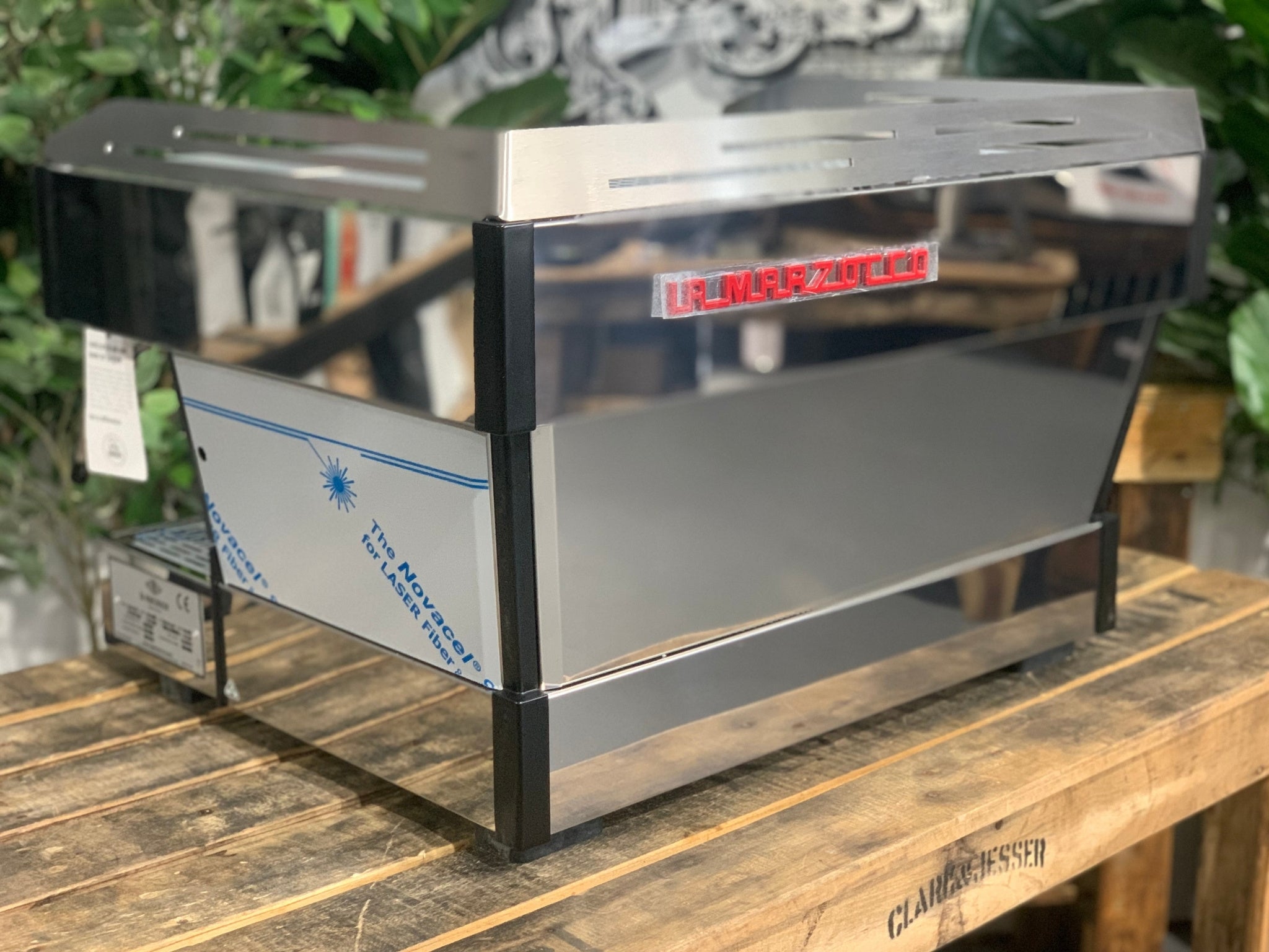 La Marzocco Linea PB 2 Group Coffee Machine Stainless - New angled back view showing the stainless steel panels and professional espresso machine design; dual boilers are integrated behind panels for consistent performance.