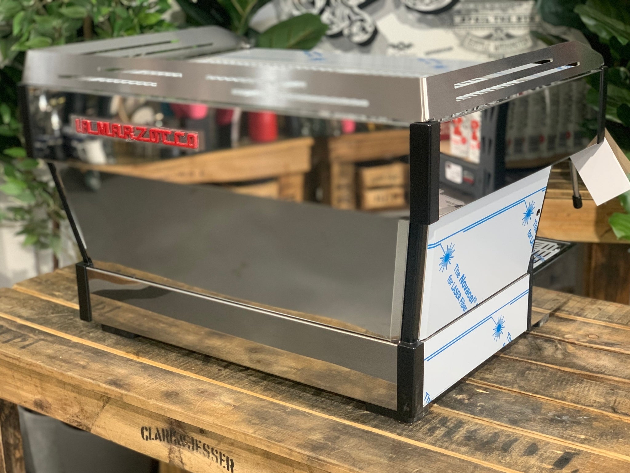 La Marzocco Linea PB 2 Group Coffee Machine Stainless - New angled back view showing the stainless steel panels and professional espresso machine design; dual boilers are integrated behind panels for consistent performance.