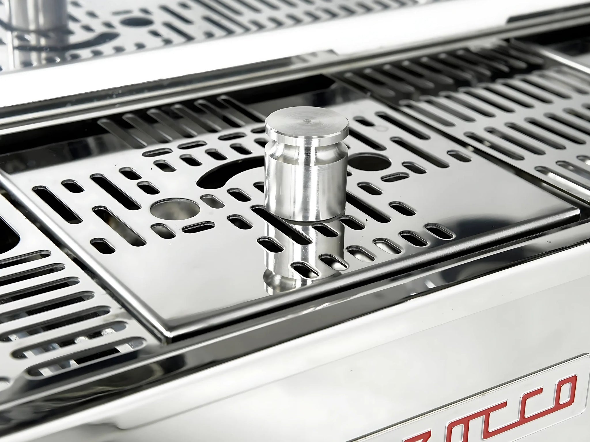 La Marzocco Linea PB ABR 2 Group Coffee Machine Stainless - New close-up showing a weight sitting on the integrated ABR drip tray scales beneath a group head, highlighting the stainless steel body and precise espresso coffee machine features in a full-size image.