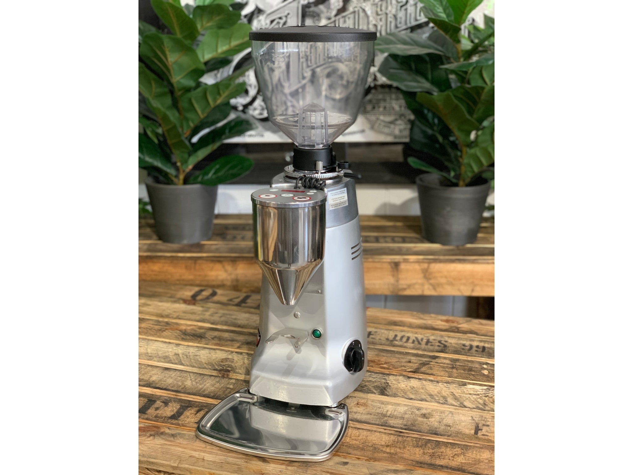 Mazzer Kony Electronic Silver Coffee Grinder on a wooden bench