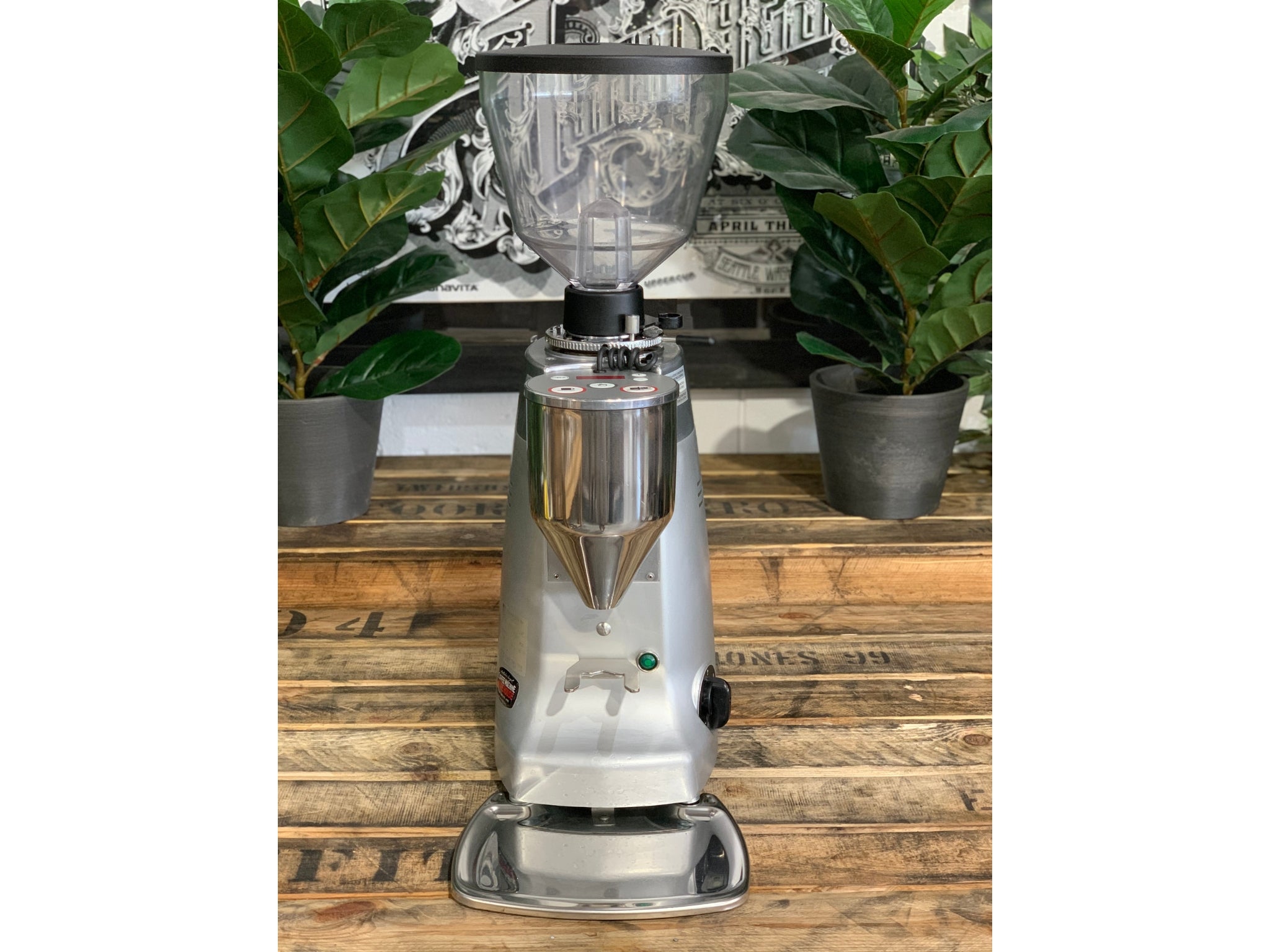 Mazzer Kony Electronic Silver Coffee Grinder on a wooden bench
