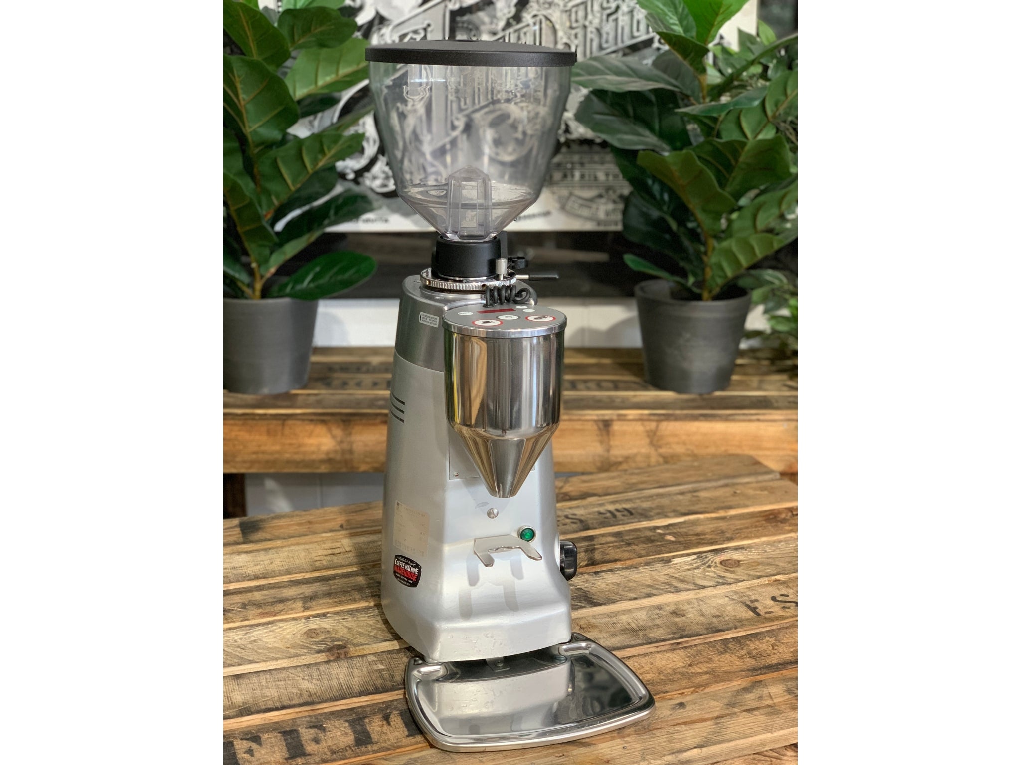 Mazzer Kony Electronic Silver Coffee Grinder on a wooden bench