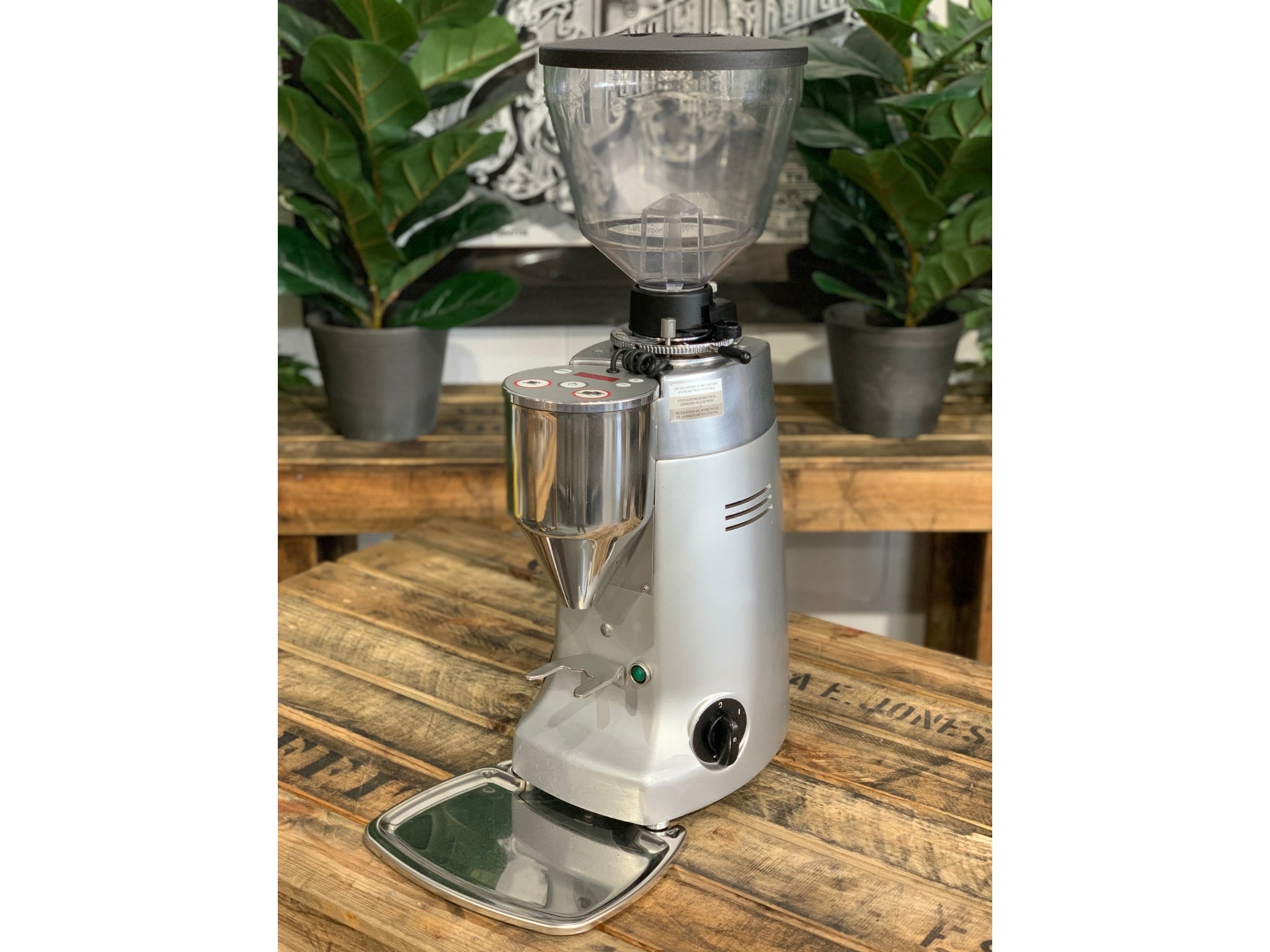 Mazzer Kony Electronic Silver Coffee Grinder on a wooden bench