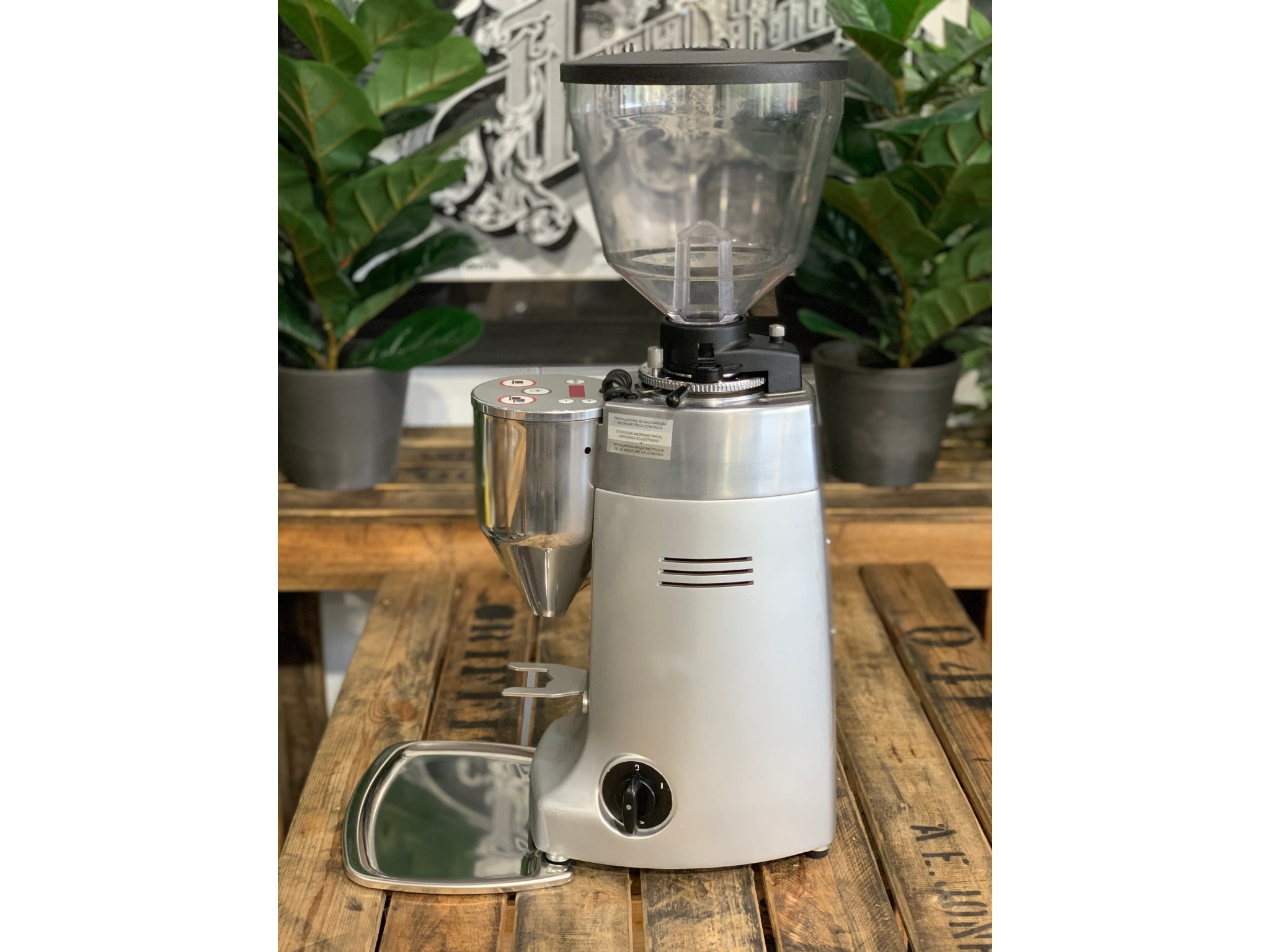 Mazzer Kony Electronic Silver Coffee Grinder on a wooden bench