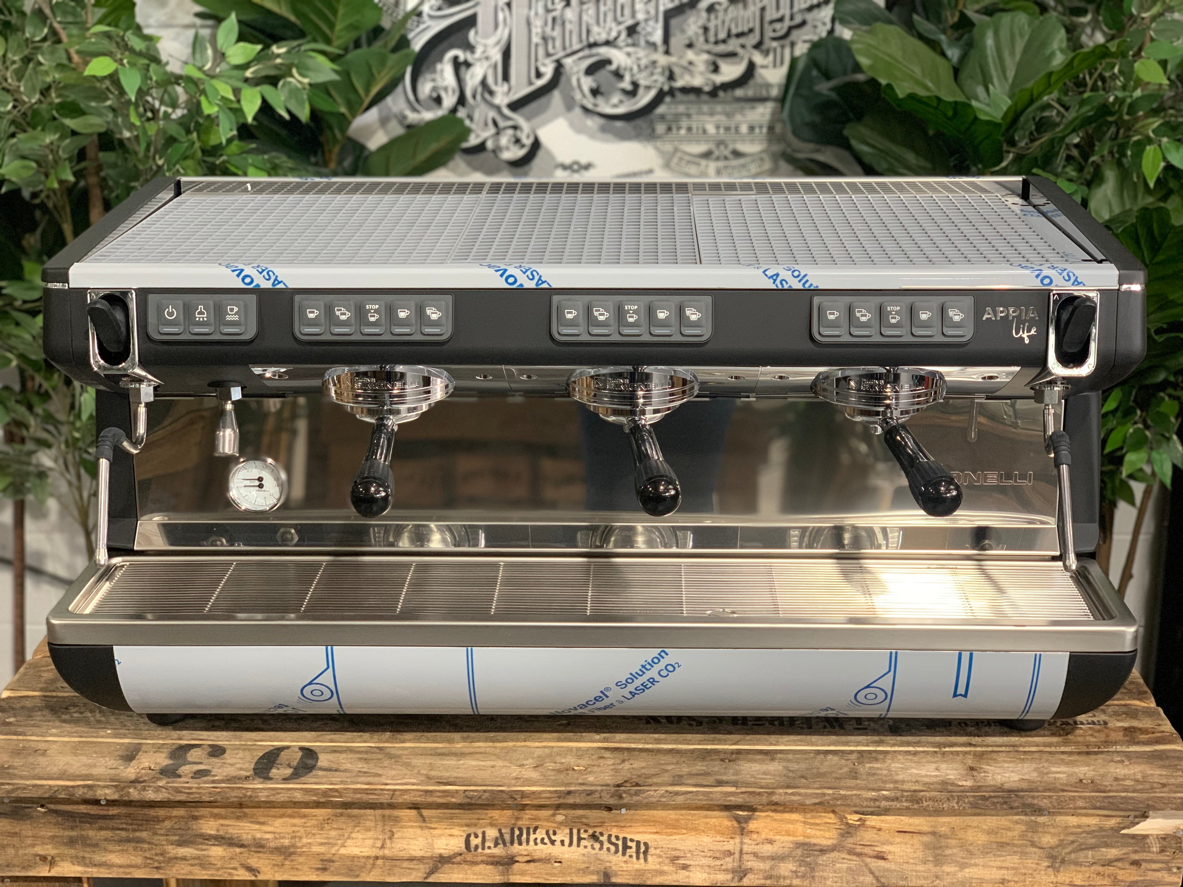 Nuova Simonelli Appia Life Timer 3 Group Coffee Machine Black with integrated shot timers on display.