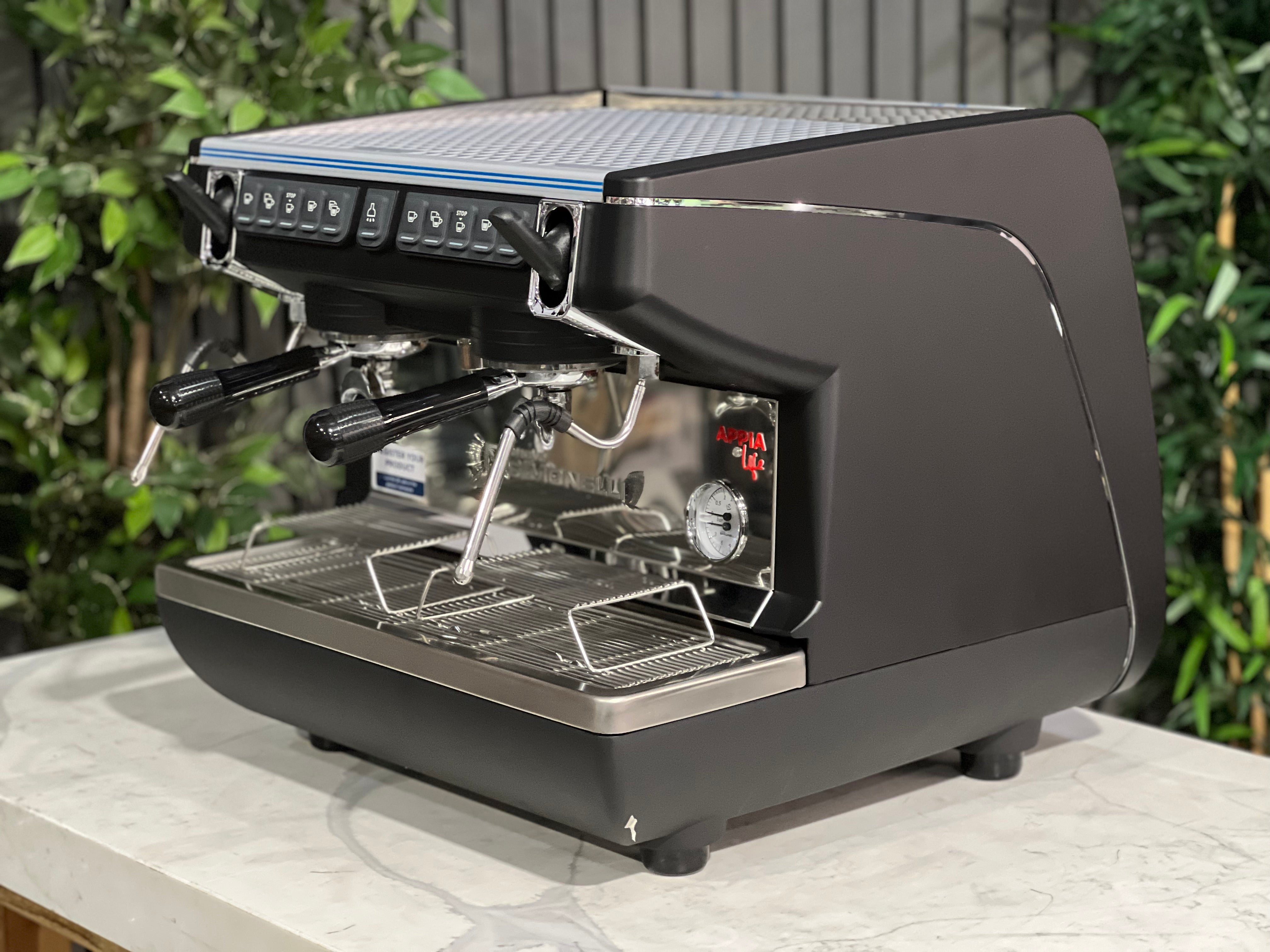 Nuova Simonelli Appia Life Compact Black 2 Group Espresso Machine displaying sleek design on a countertop.