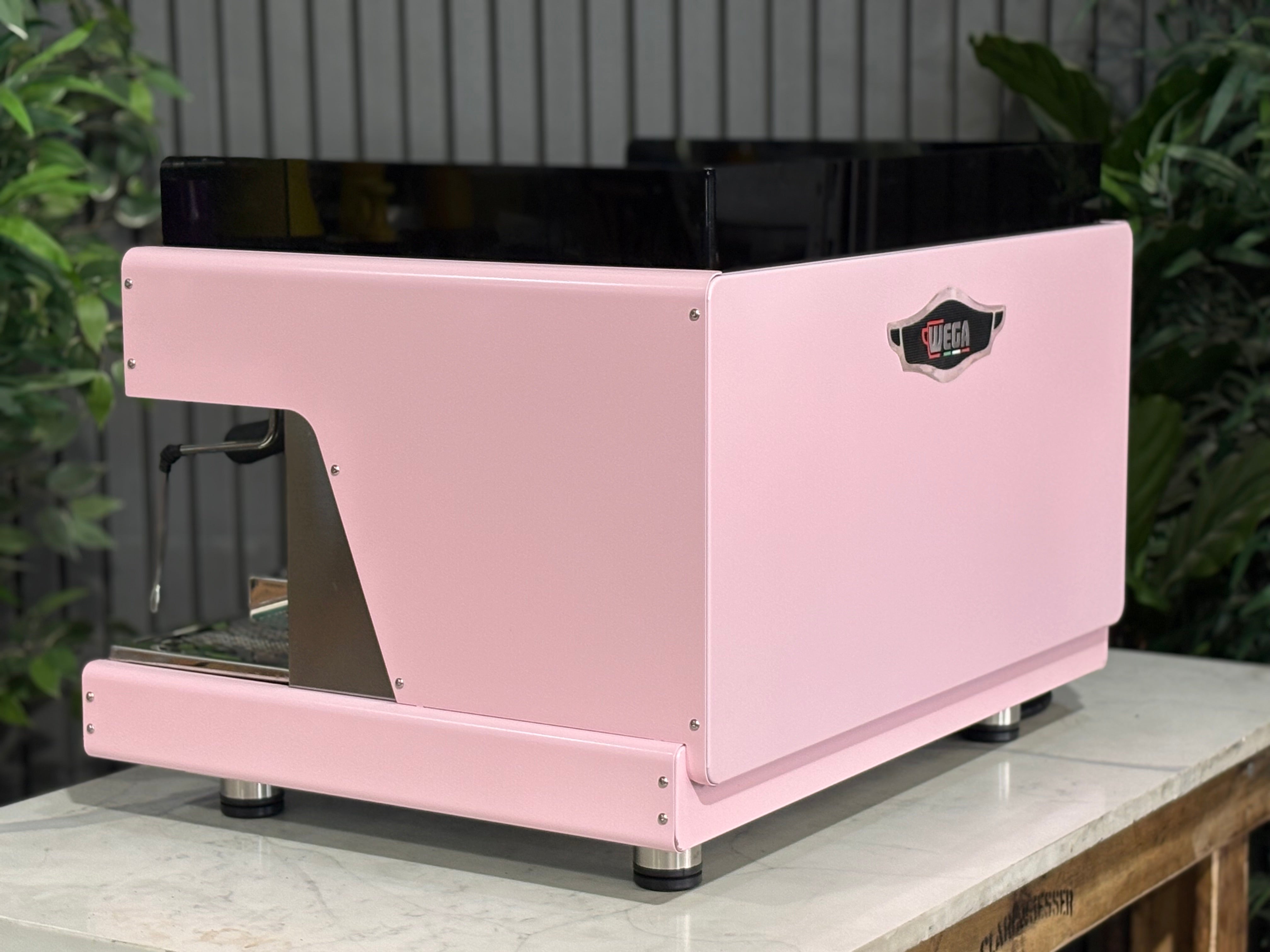 Wega Pegaso EVD 2 Group Coffee Machine Pink Lily Espresso Machine on display with a pink finish