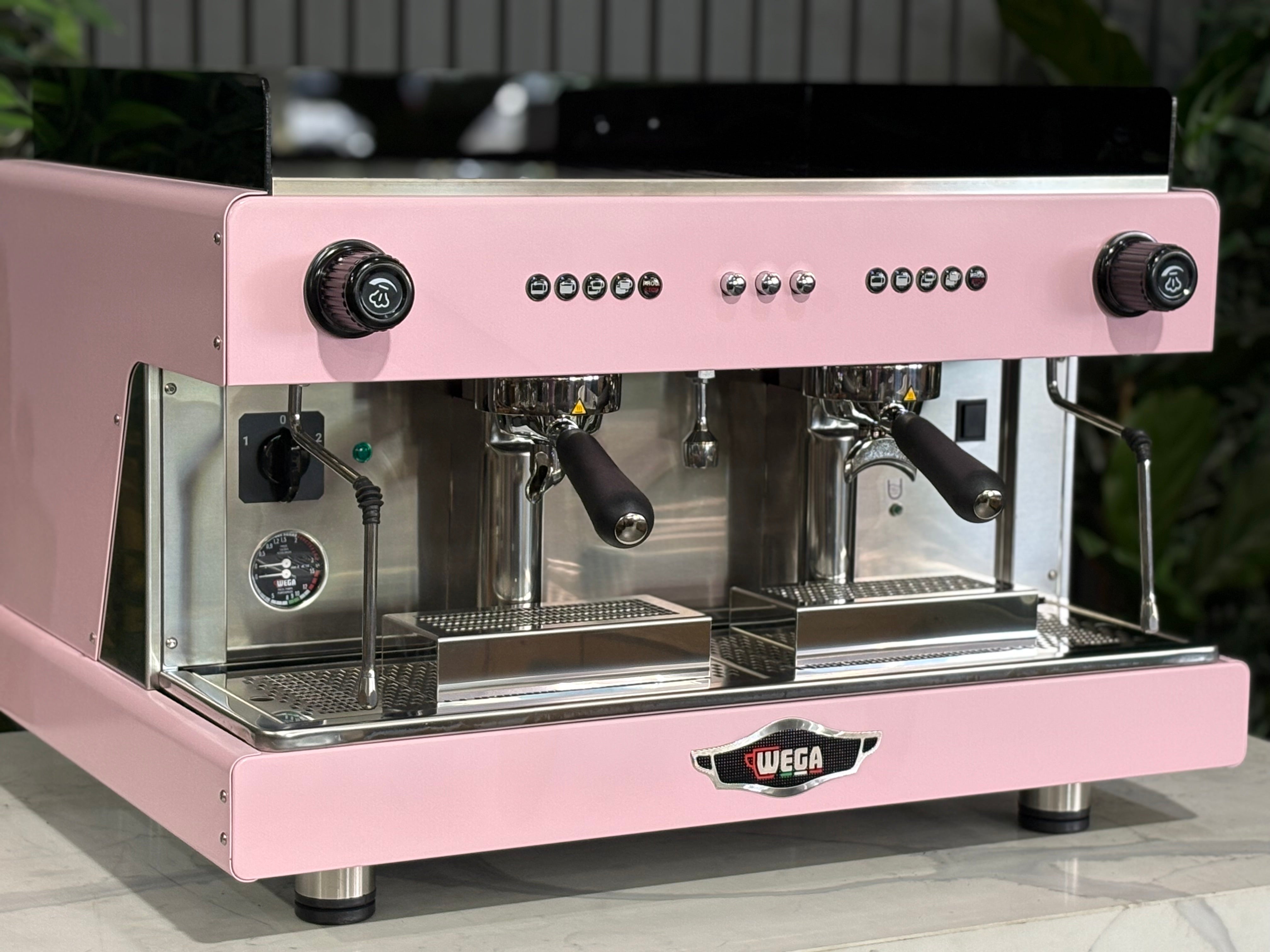 Wega Pegaso EVD 2 Group Coffee Machine Pink Lily Espresso Machine on display with sleek design and dual brewing heads.