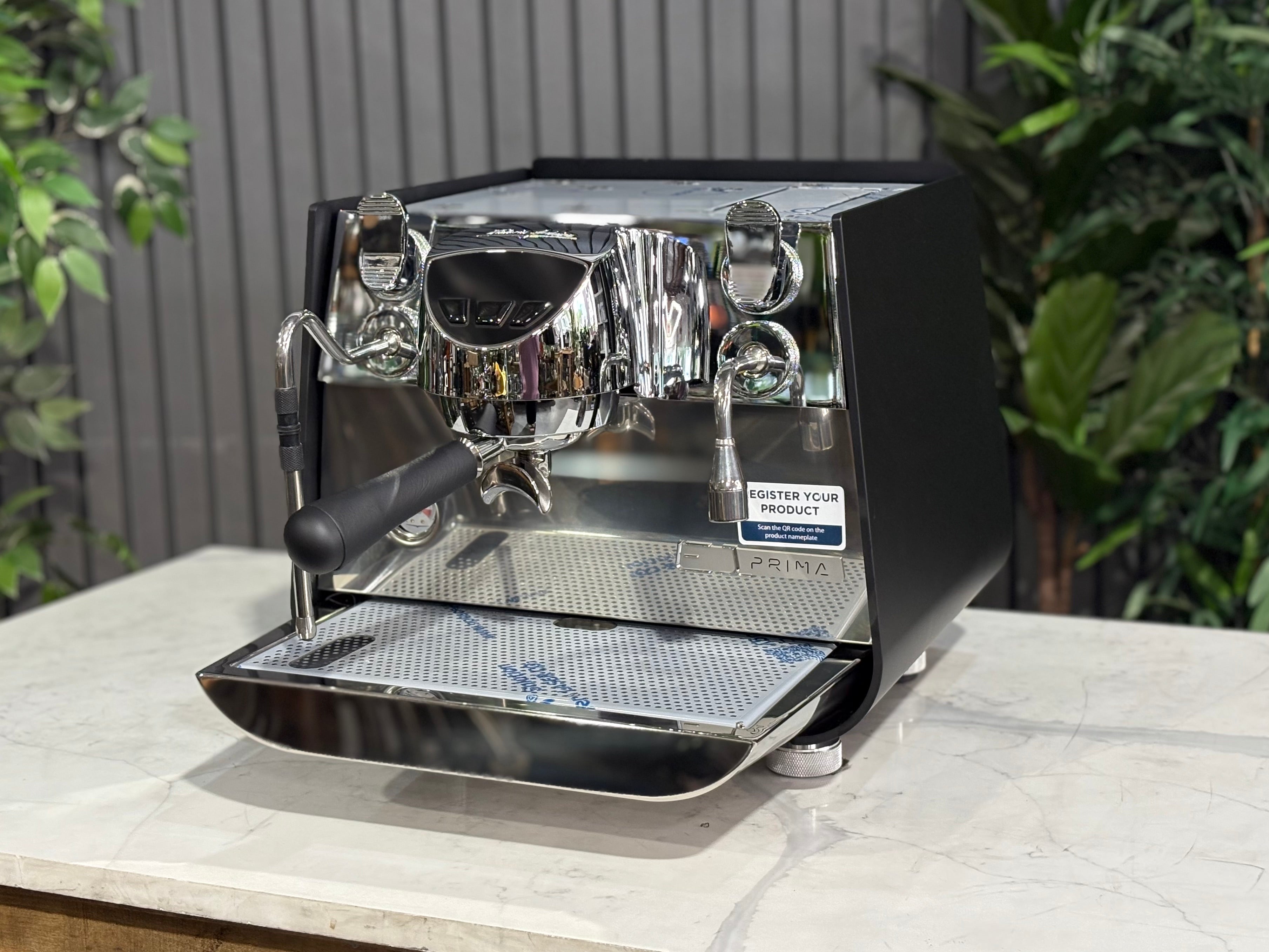 Victoria Arduino Eagle One Prima 1 Group Coffee Machine Black - New on a countertop with sleek stainless steel design.