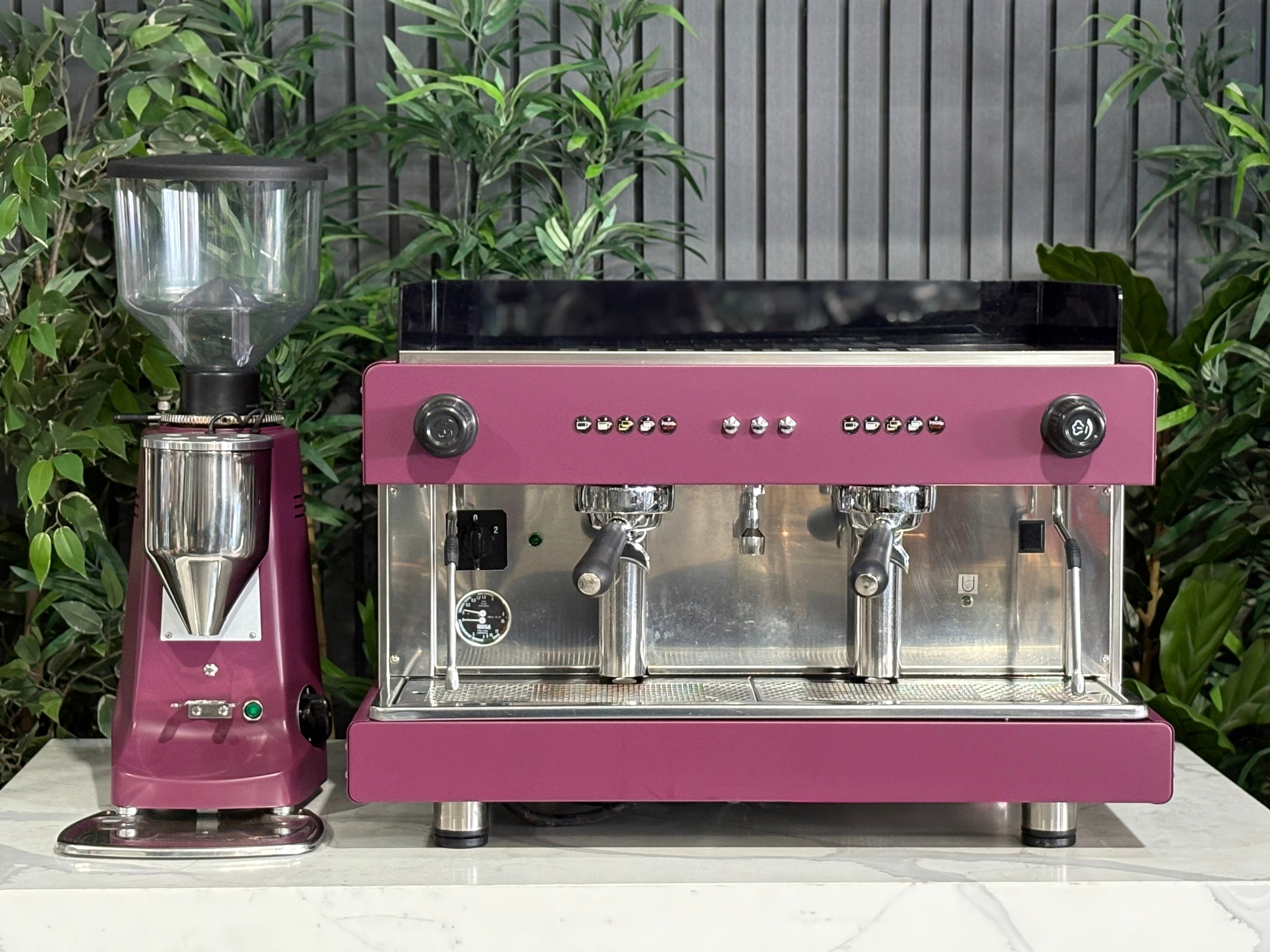 Wega Pegaso EVD 2 Group Coffee Machine & Mazzer Major Electronic Grinder in deep pink, showcasing commercial coffee equipment.