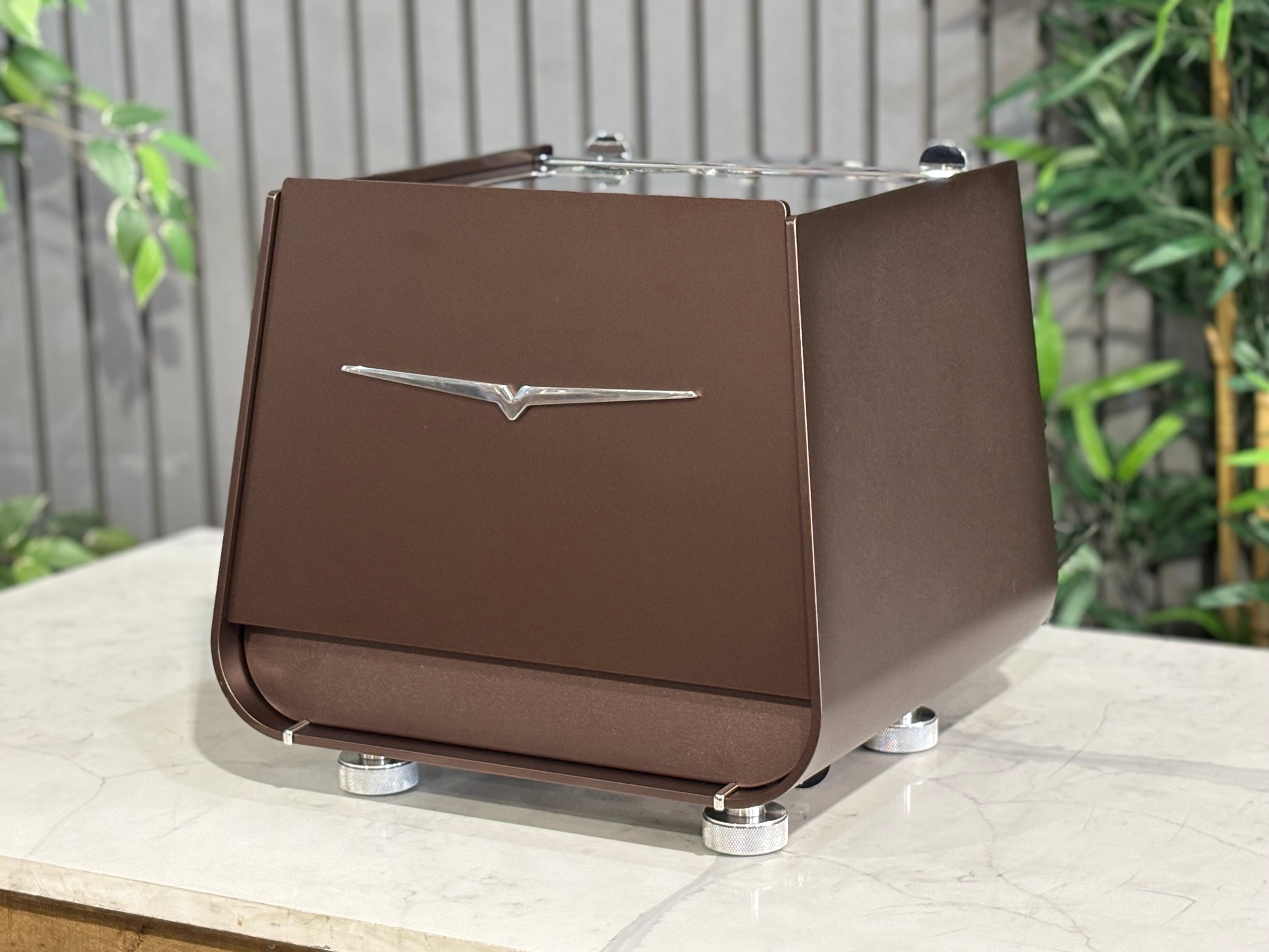 Victoria Arduino Eagle One Prima 1 Group Espresso Machine in custom burnished copper finish on a marble surface.