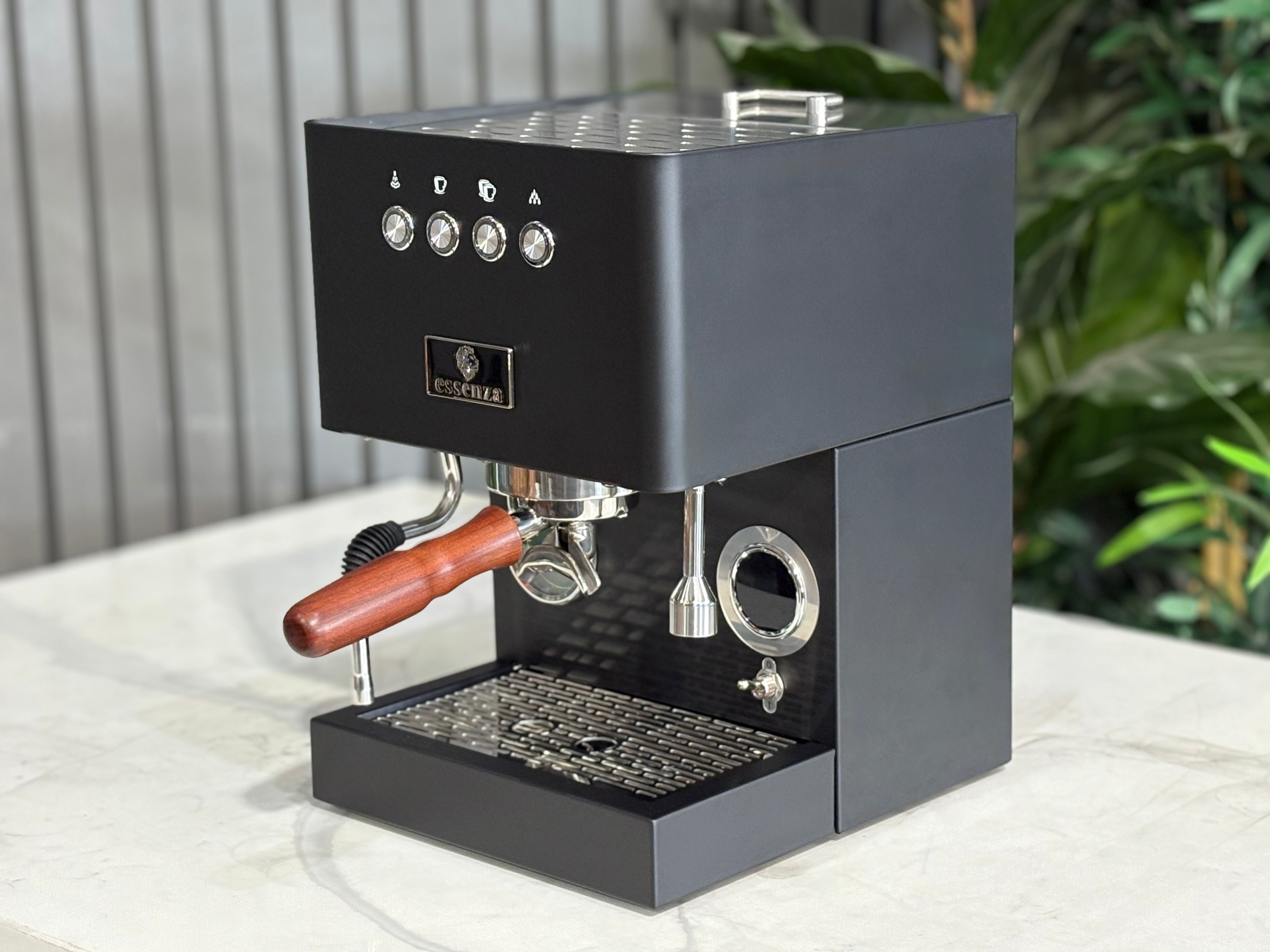 Essenza Nina 1 Group Coffee Machine Stainless - New, stylish black espresso machine with wooden handle.