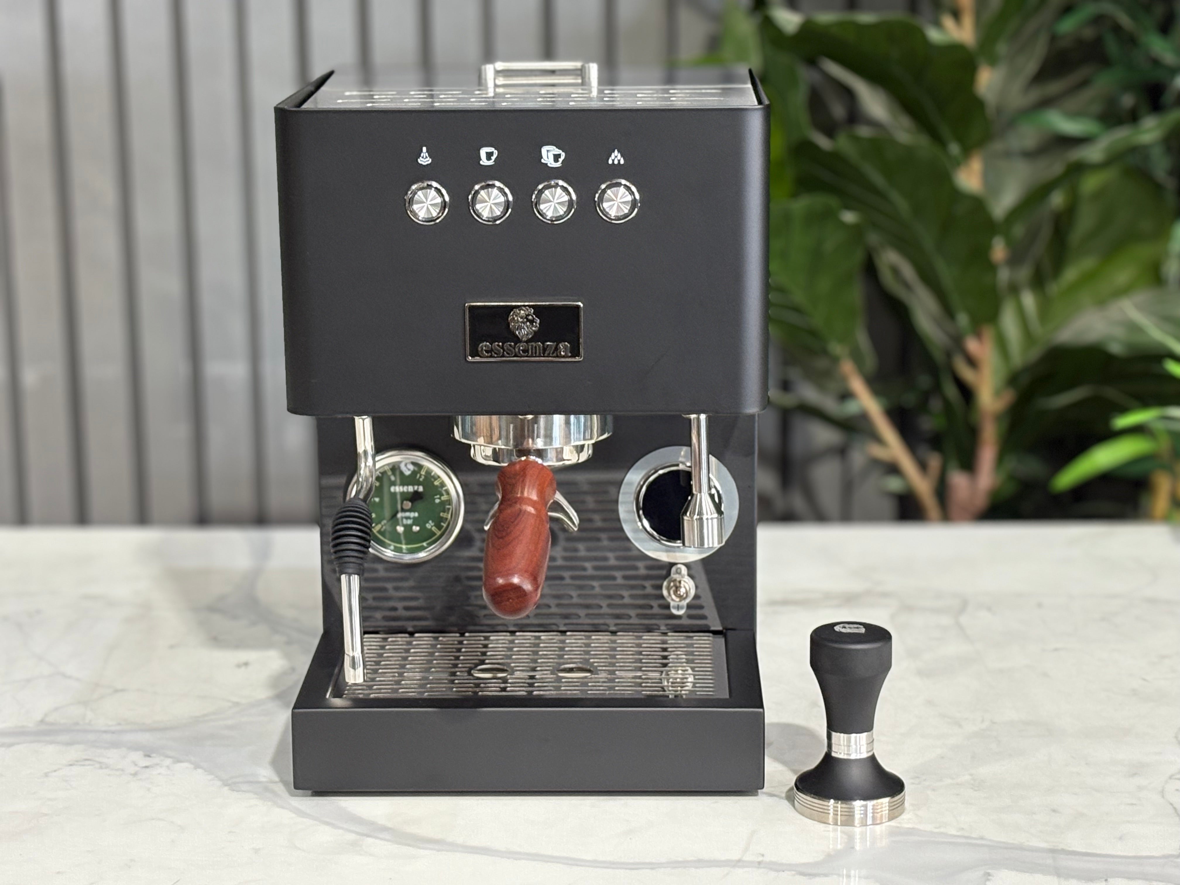 Essenza Nina 1 Group Coffee Machine Stainless in black with wood handle and gauge, designed for modern home use.