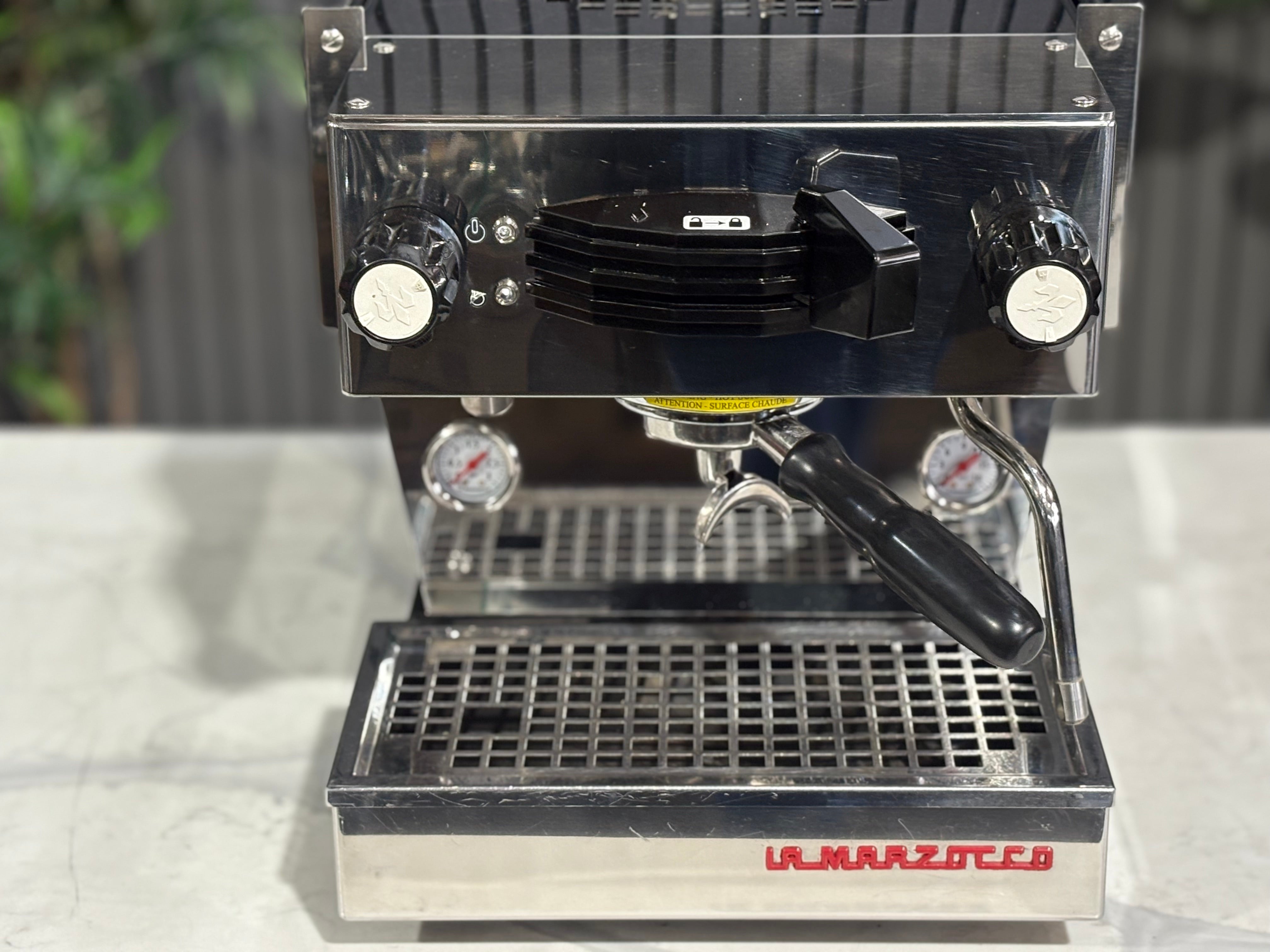 La Marzocco Linea Mini MP 1 Group Coffee Machine Stainless - Used, close-up view showcasing knobs and portafilter.