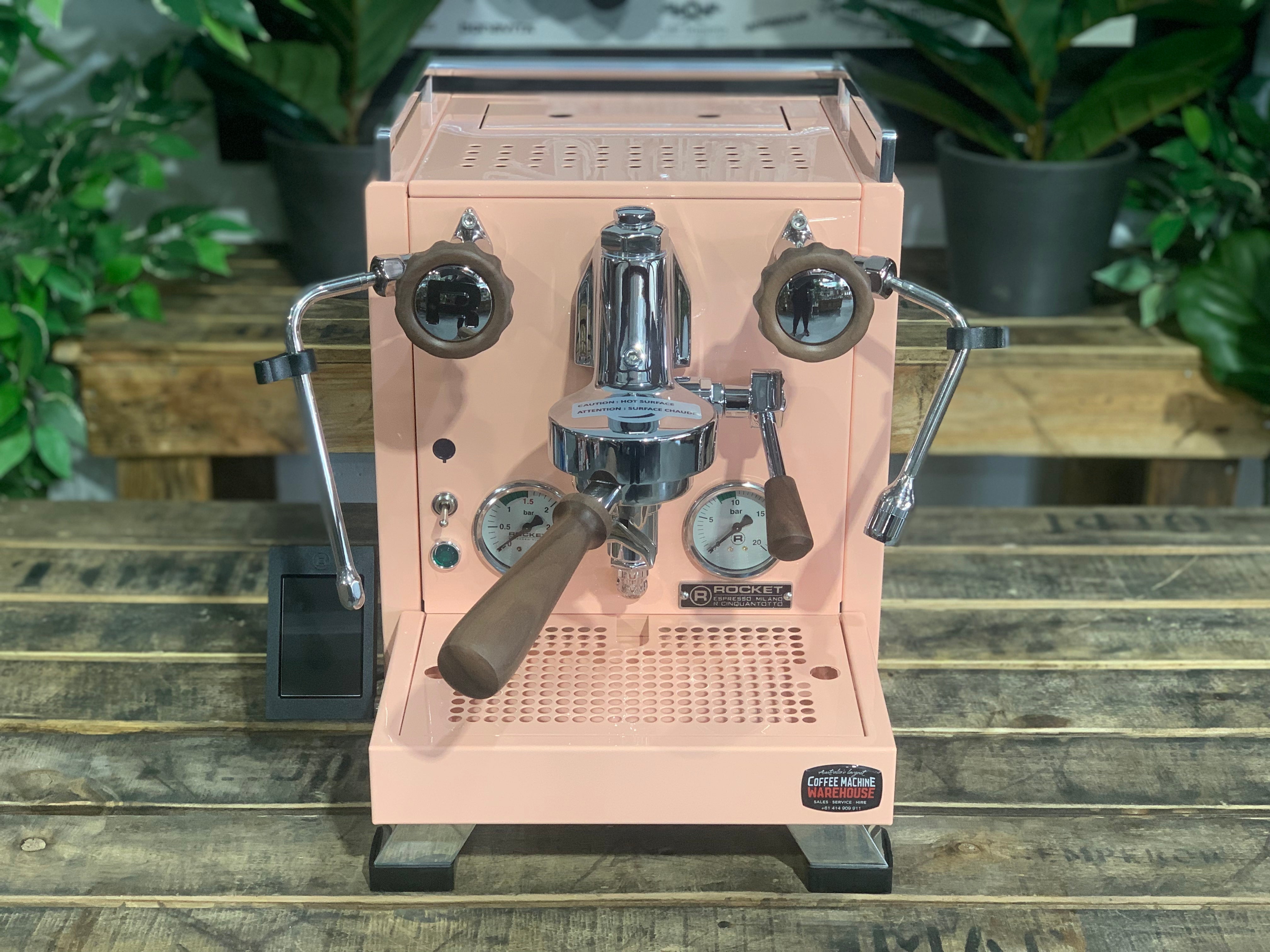 Rocket Cinquantotto R58 1 Group Coffee Machine - New in pink finish on wooden table with plants in background