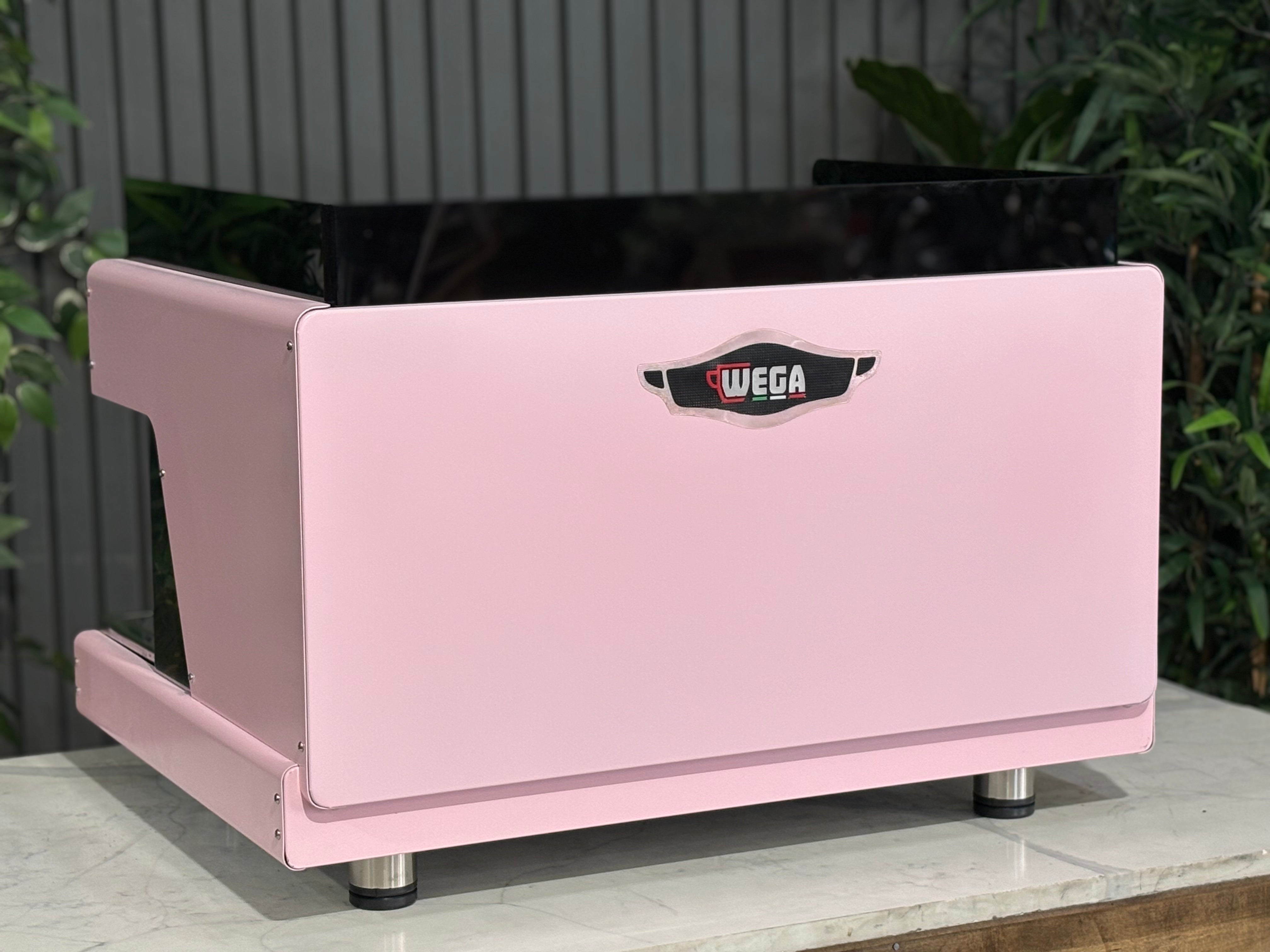 Wega Pegaso EVD 2 Group Coffee Machine Pink Lily Espresso Machine displayed on a countertop with a modern design.